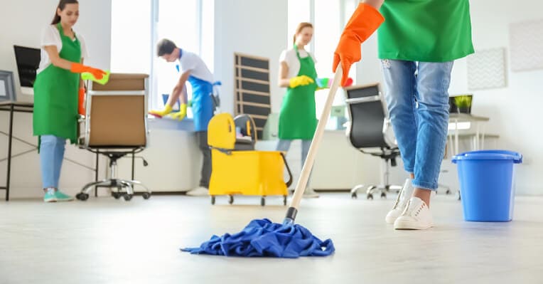 mopping a school floor NWCE